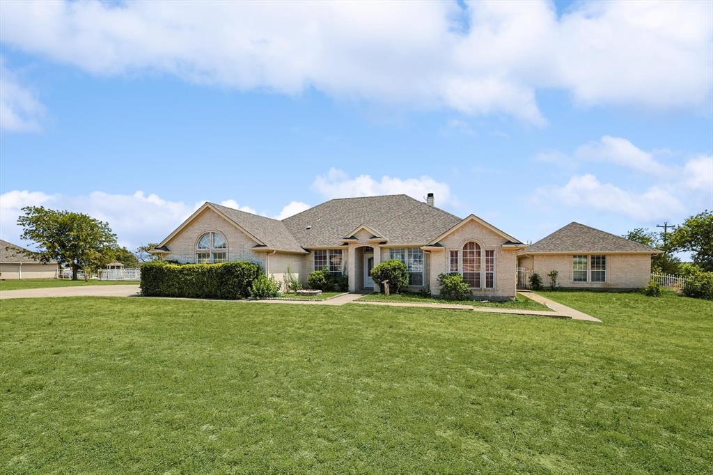 2933 Alliance Trail Haslet, TX 76052 - Photo 1 of 1 a front view of a house with a yard and garage