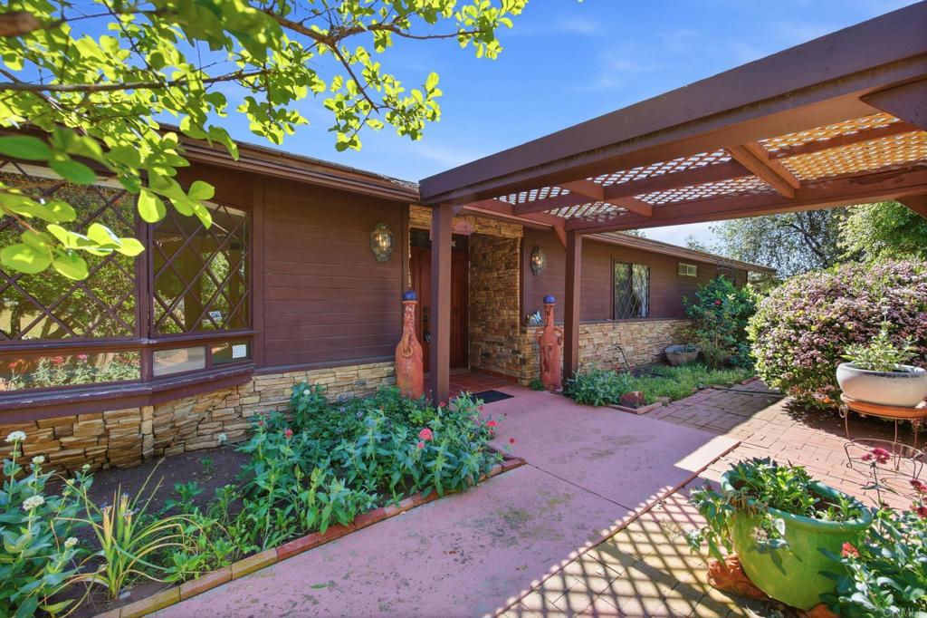 2807 South Grade Road Alpine, CA 91901 - Photo 32 of 42 a front view of a house with garden