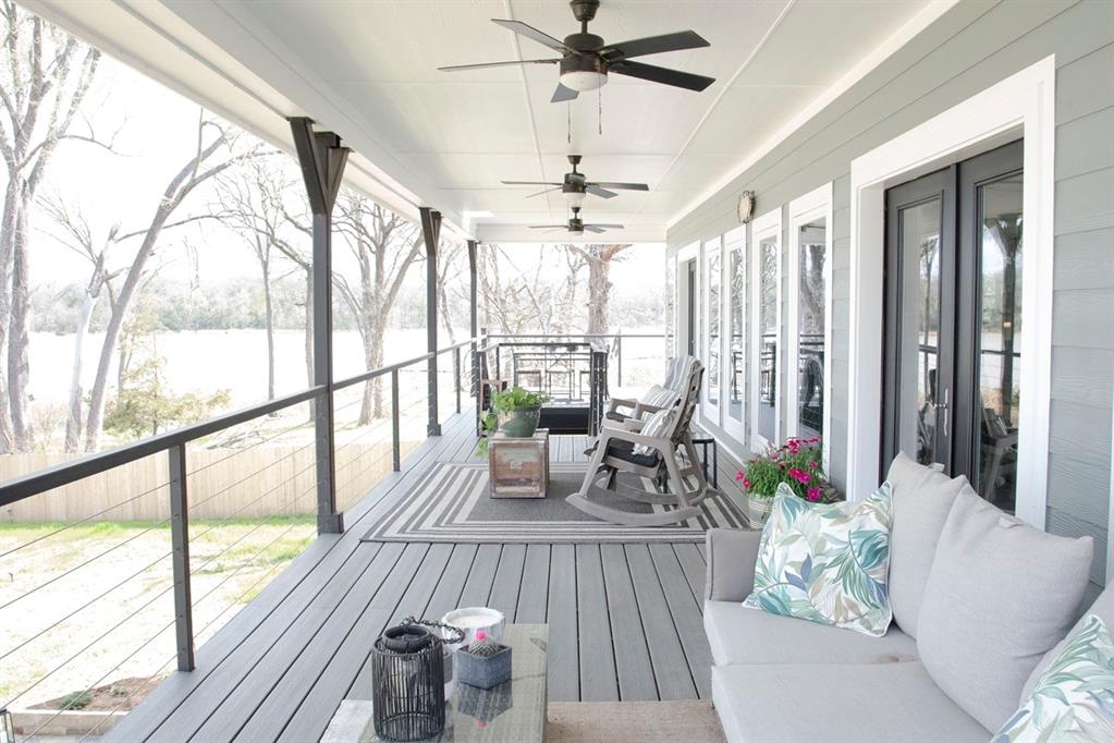 298 Redbud A Mexia, TX 76667 - Photo 8 of 40 a living room with furniture and floor to ceiling windows