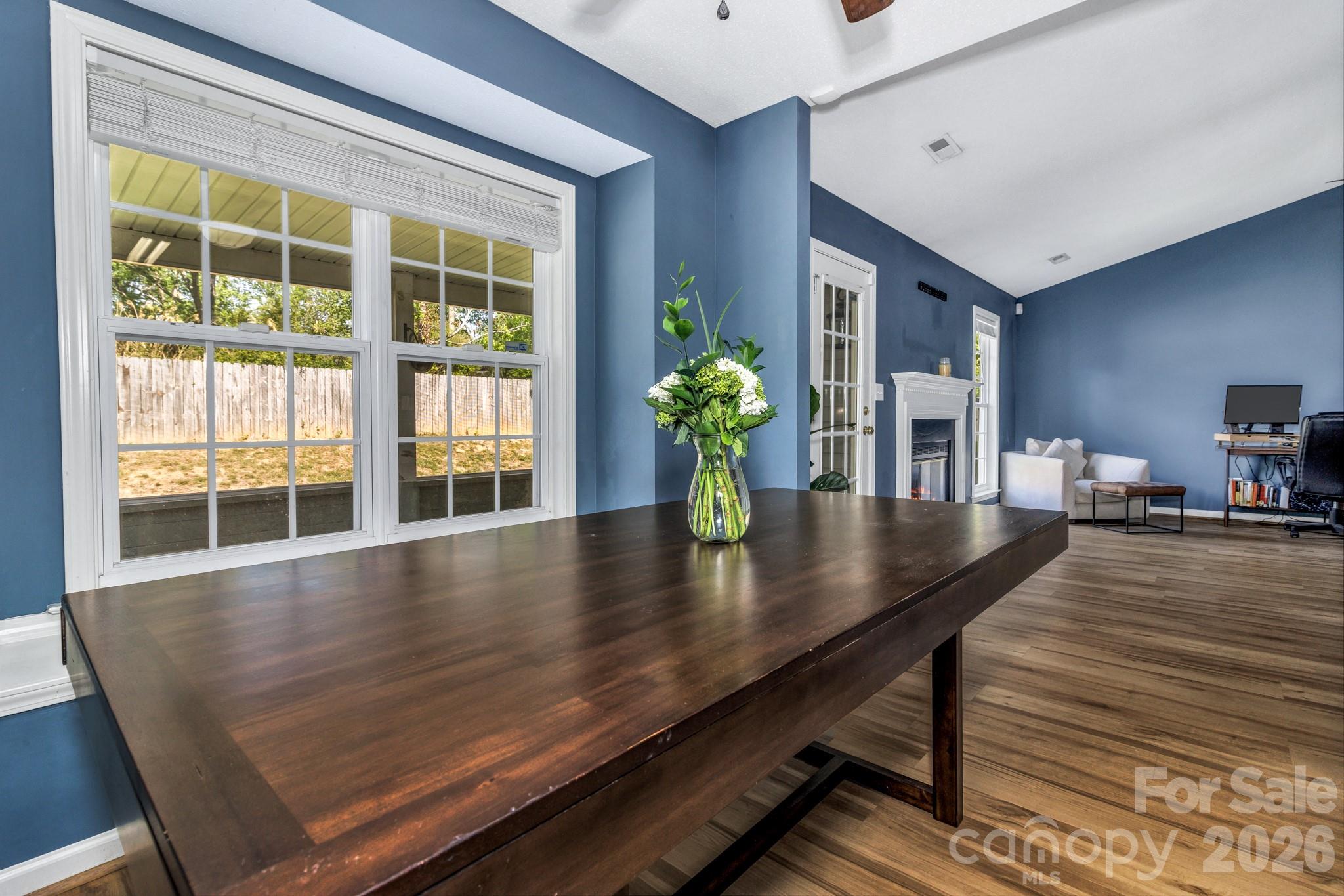 58 South Sunberry Trail Fletcher, NC 28732 - Photo 18 of 41 a view of a dining room with furniture window and wooden floor