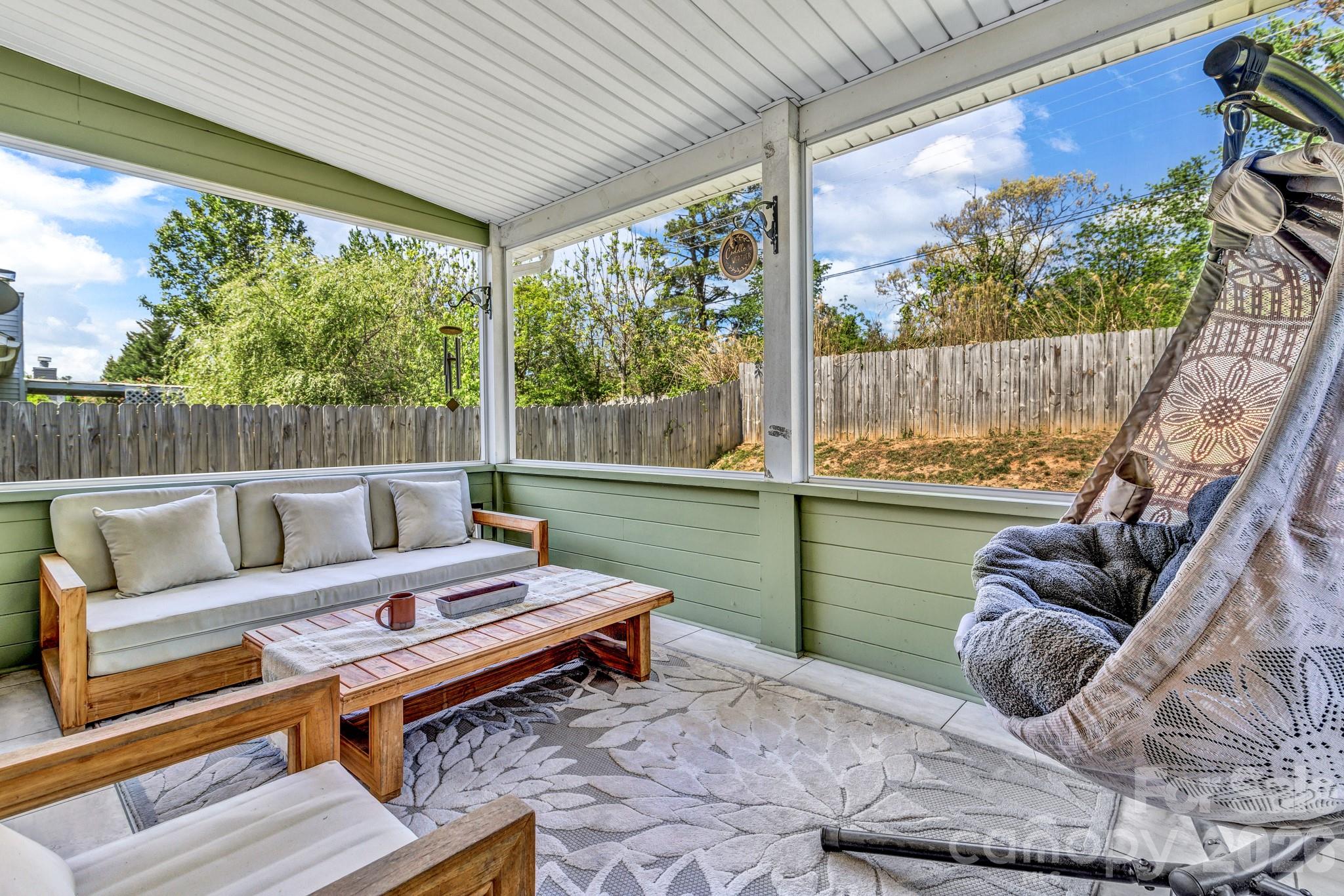 58 South Sunberry Trail Fletcher, NC 28732 - Photo 20 of 41 a outdoor living space with furniture and a potted plant