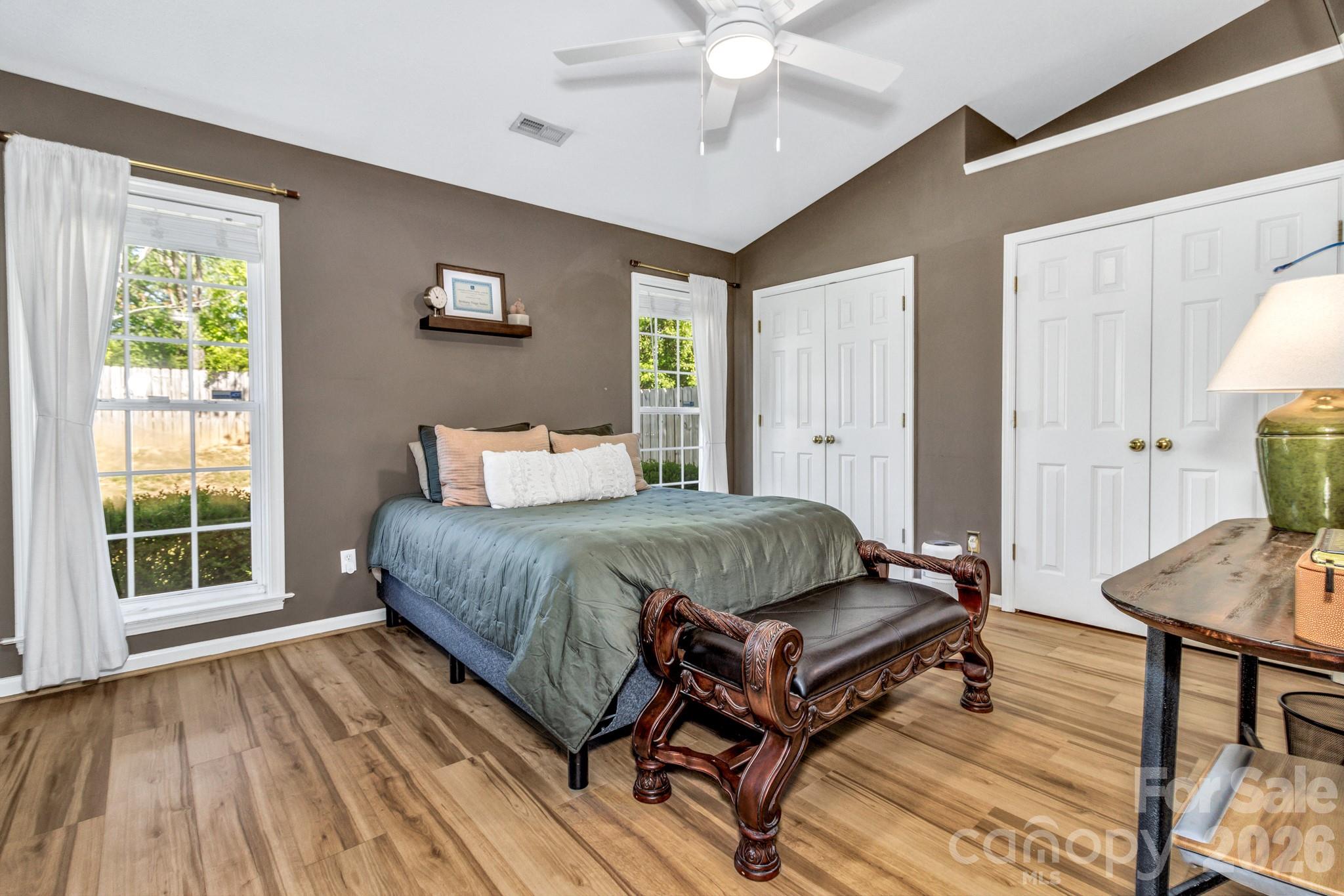 58 South Sunberry Trail Fletcher, NC 28732 - Photo 24 of 41 a spacious bedroom with a bed a window and dresser