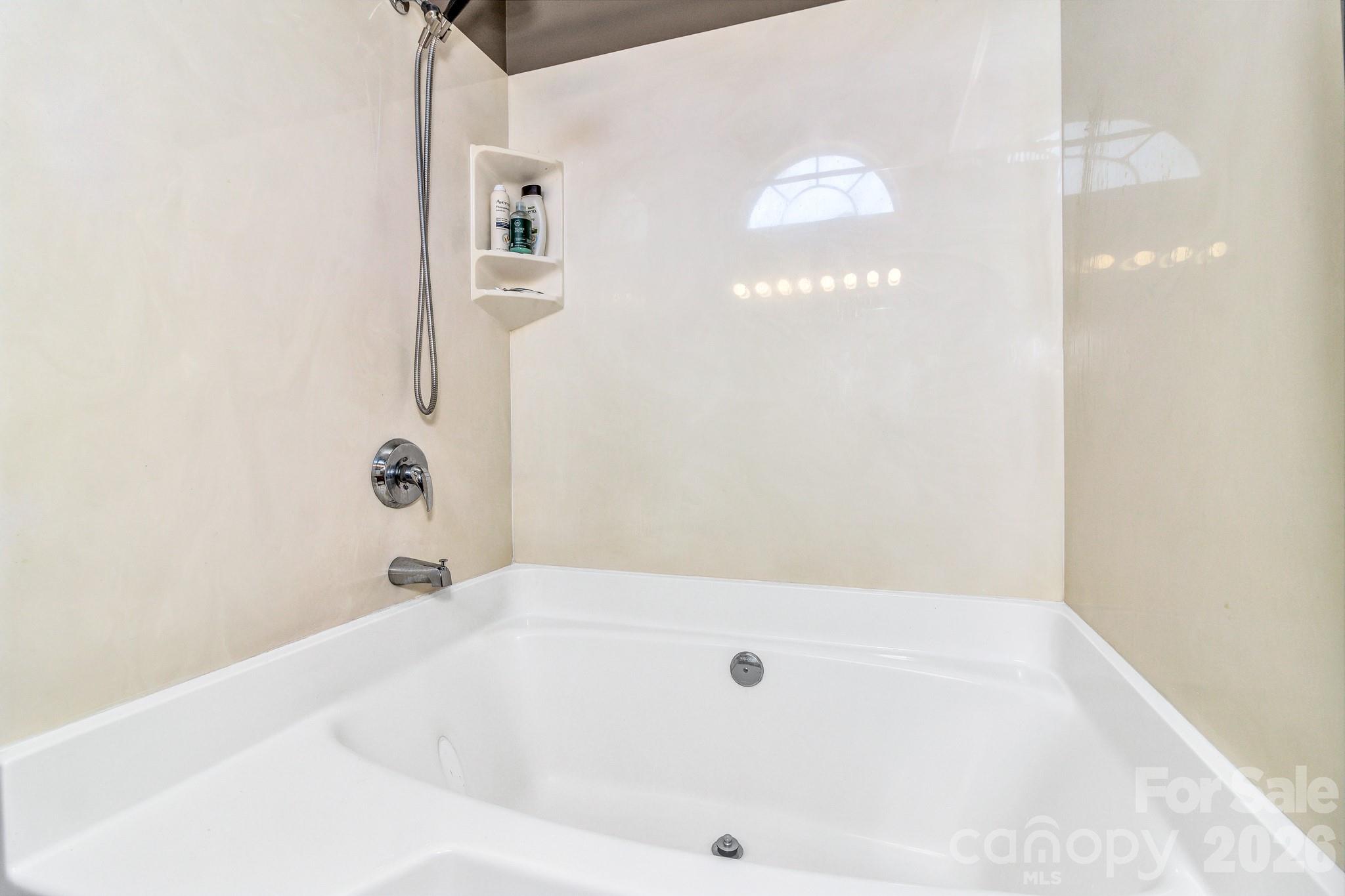 58 South Sunberry Trail Fletcher, NC 28732 - Photo 29 of 41 a bathroom with a bathtub