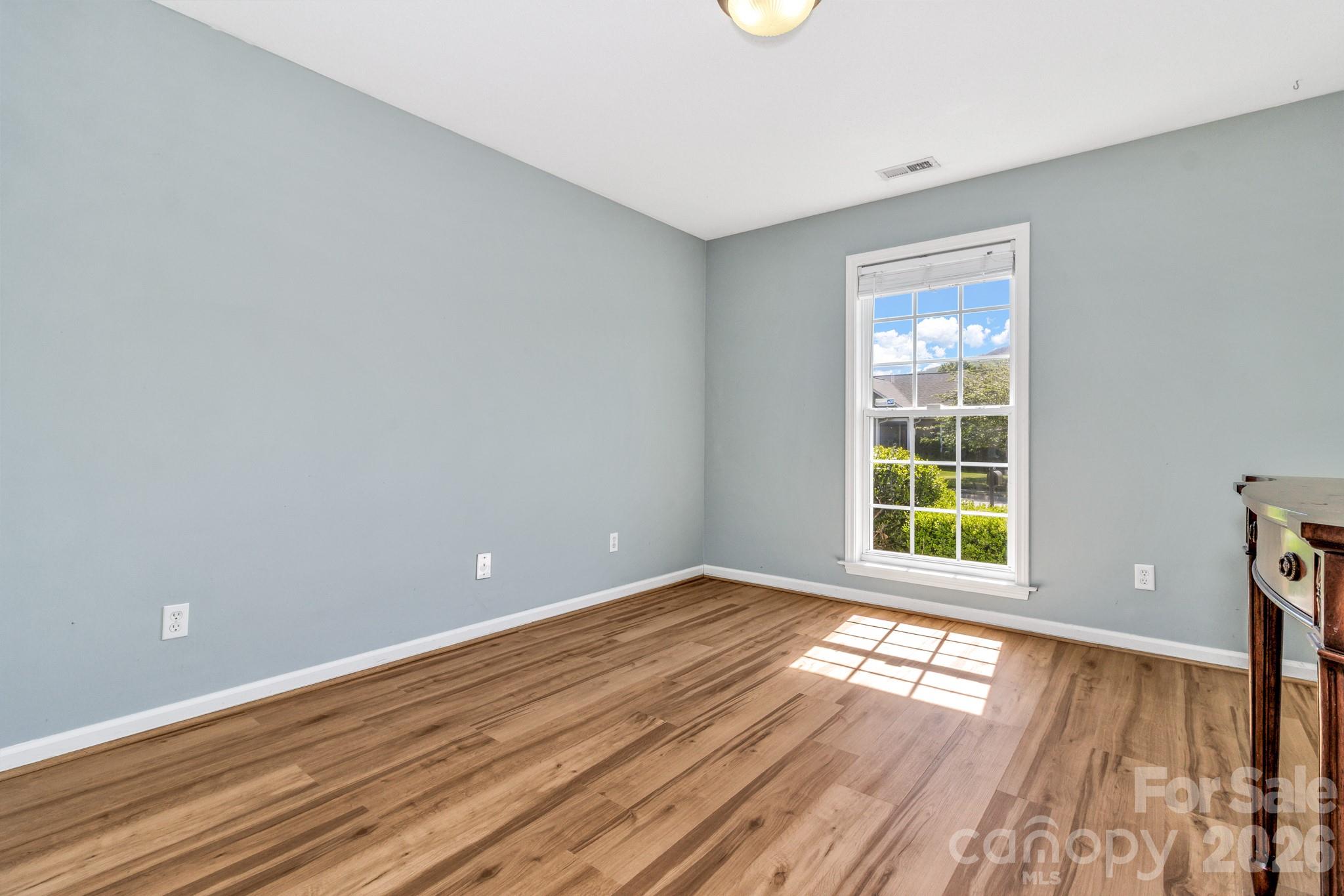 58 South Sunberry Trail Fletcher, NC 28732 - Photo 31 of 41 wooden floor in an empty room with a window