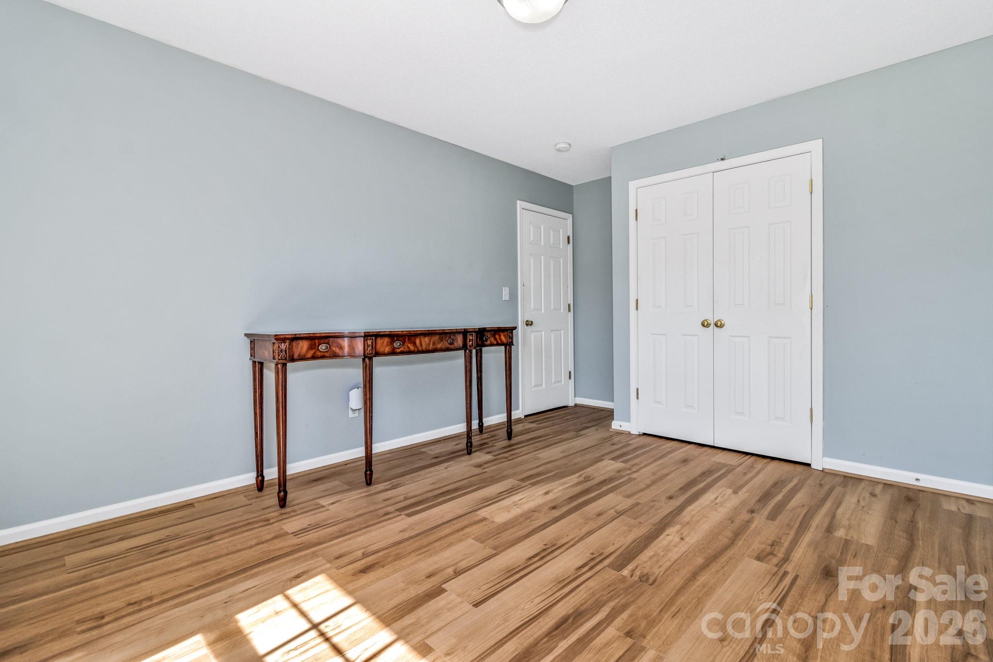 58 South Sunberry Trail Fletcher, NC 28732 - Photo 32 of 41 a view of empty room with wooden floor and fan
