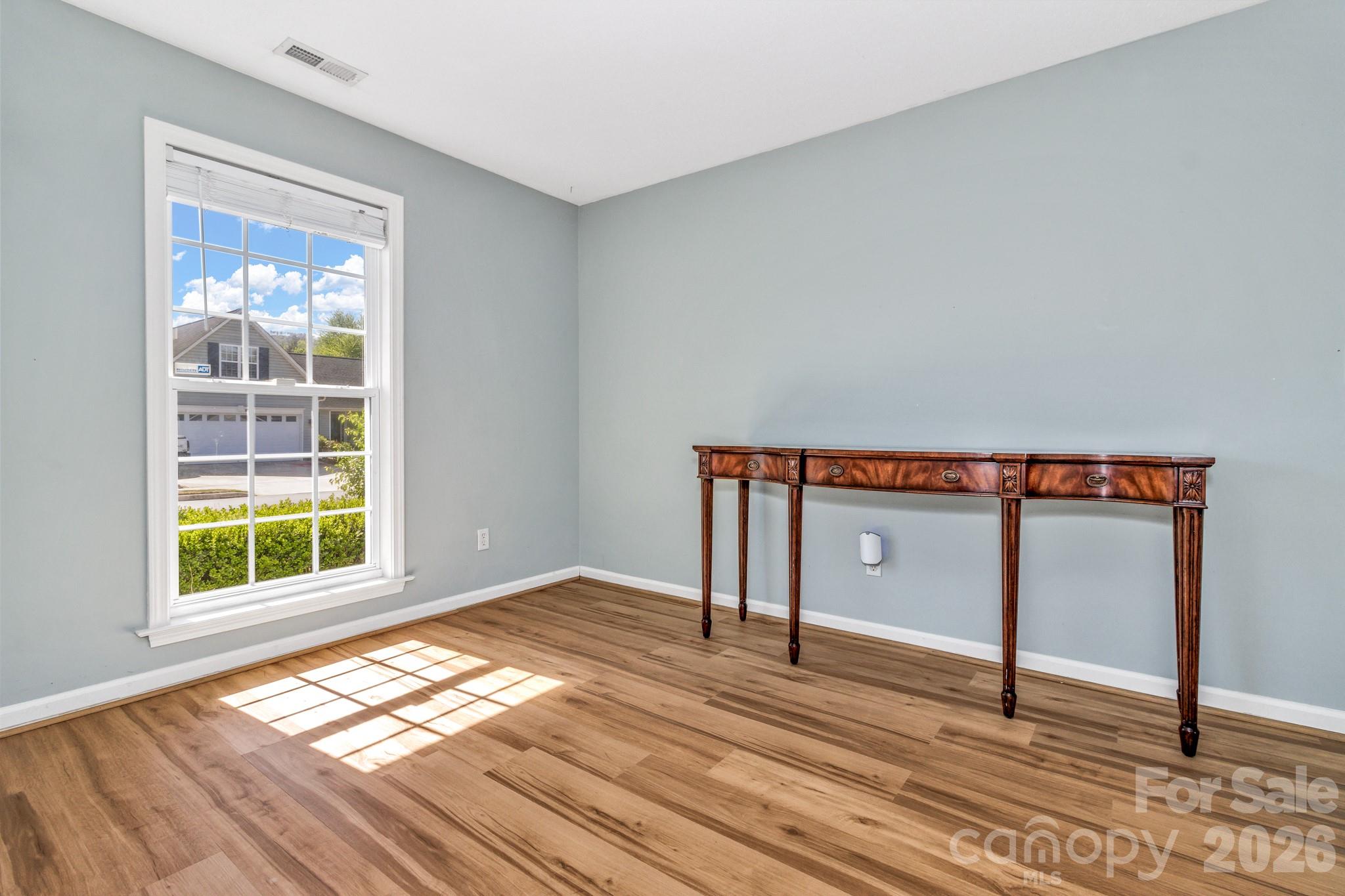 58 South Sunberry Trail Fletcher, NC 28732 - Photo 34 of 41 a view of a room with wooden floor and window