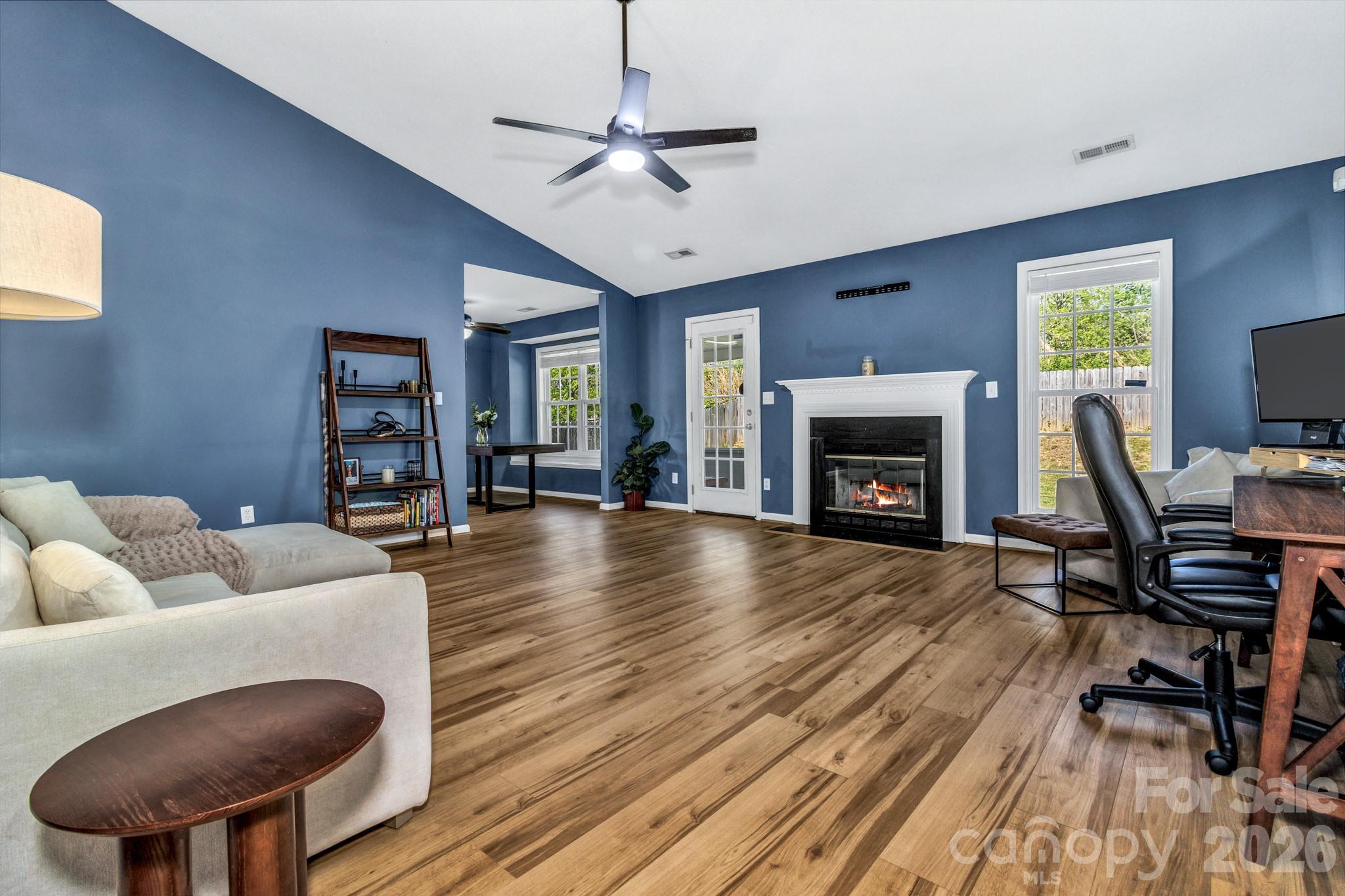 58 South Sunberry Trail Fletcher, NC 28732 - Photo 6 of 41 a living room with furniture and a fireplace