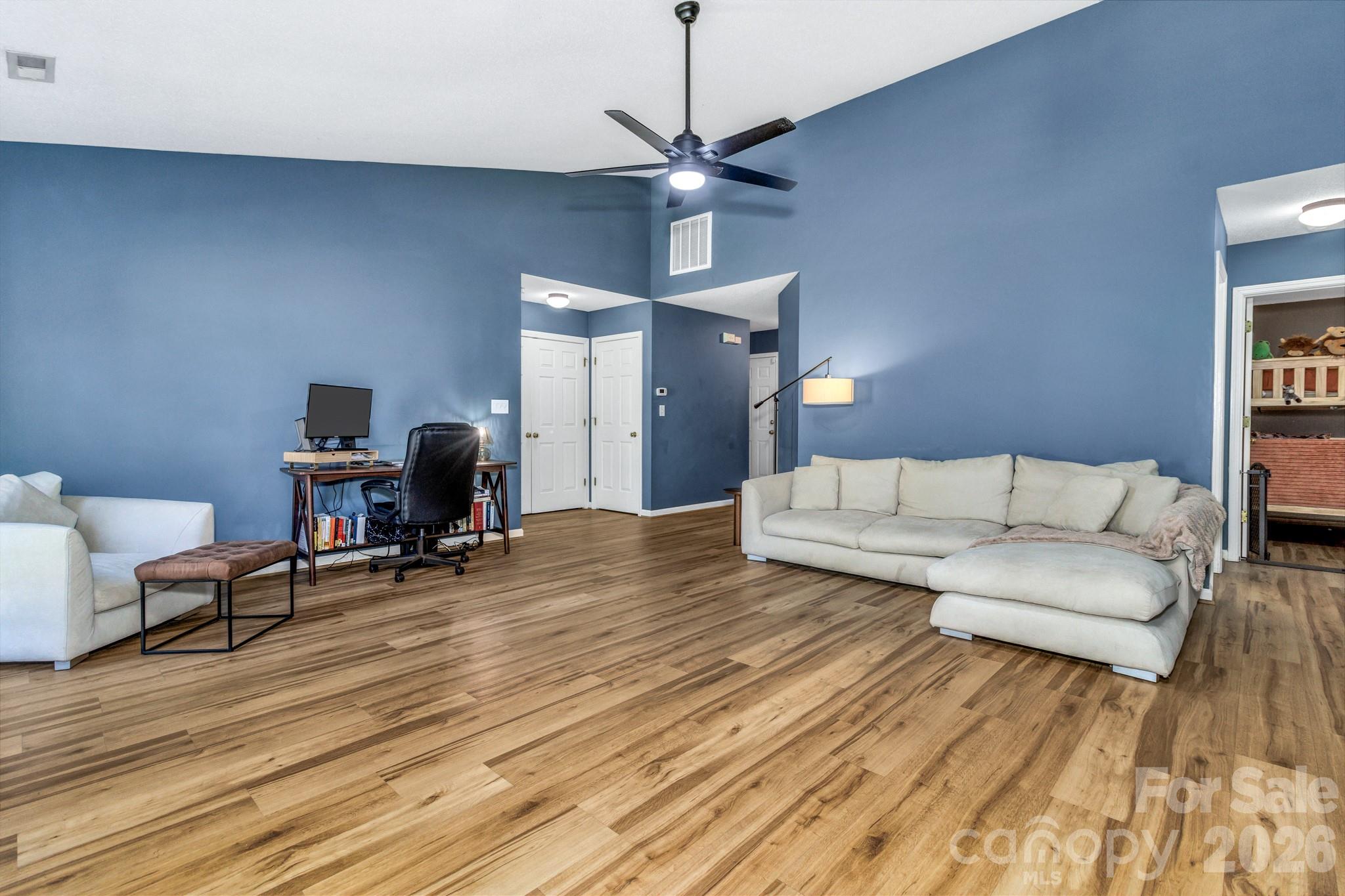 58 South Sunberry Trail Fletcher, NC 28732 - Photo 7 of 41 a living room with furniture and a wooden floor