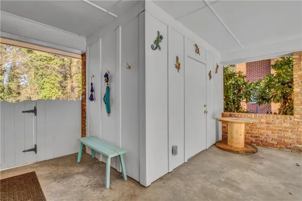 a view of entryway with furniture and a window