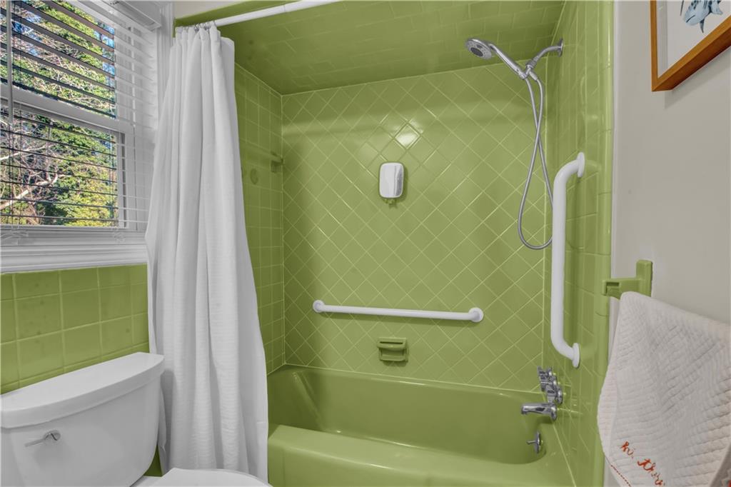 3155 Hogan Road Southwest Atlanta, GA 30331 - Photo 10 of 15 a bathroom with a shower and a toilet