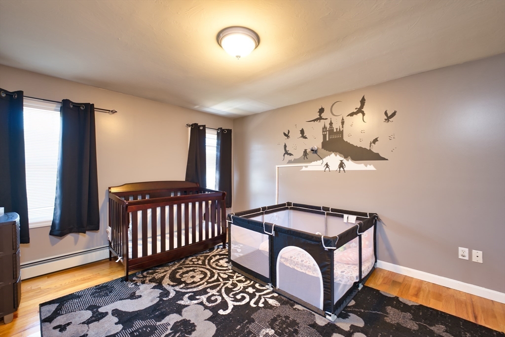 52 Pershing Avenue Acushnet, MA 02743 - Photo 16 of 27 a bedroom with furniture and window