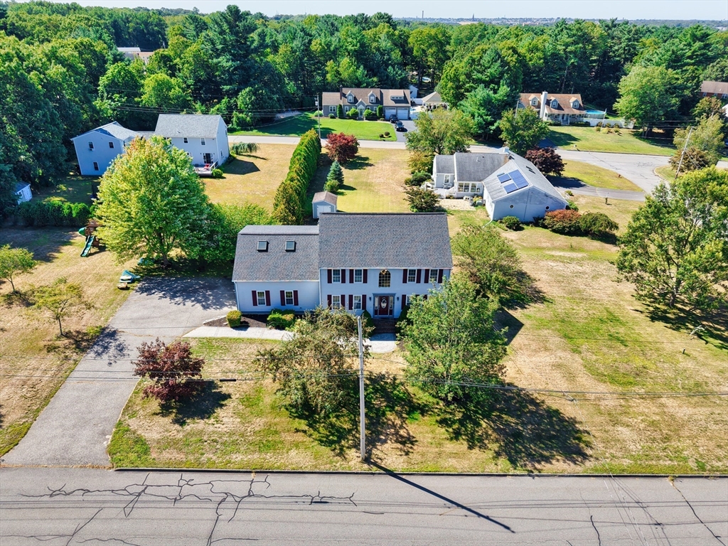 52 Pershing Avenue Acushnet, MA 02743 - Photo 2 of 27 an aerial view of a house with yard swimming pool and outdoor seating