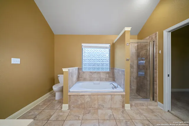 a bathroom with a toilet