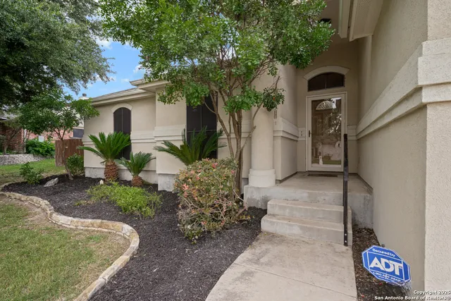 a view of a back yard of the house