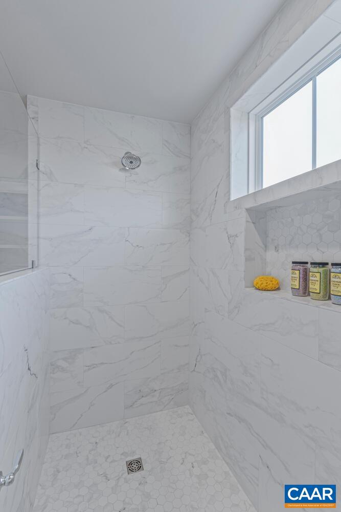 2 Agatha Ridge Lane Crozet, VA 22932 - Photo 29 of 42 a bathroom with a bathtub