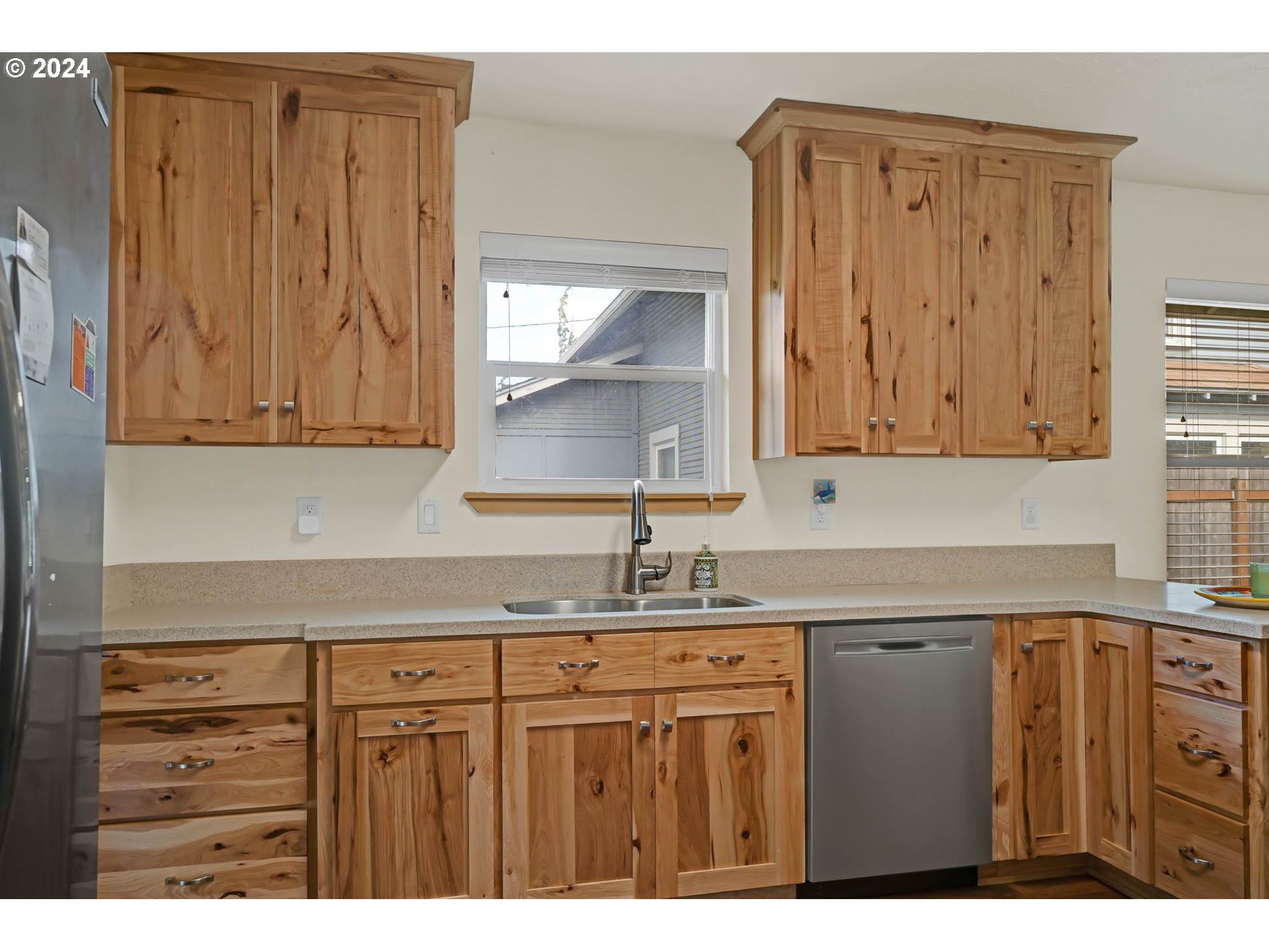 830 G Street Springfield, OR 97477 - Photo 15 of 38 a kitchen with a sink and cabinets