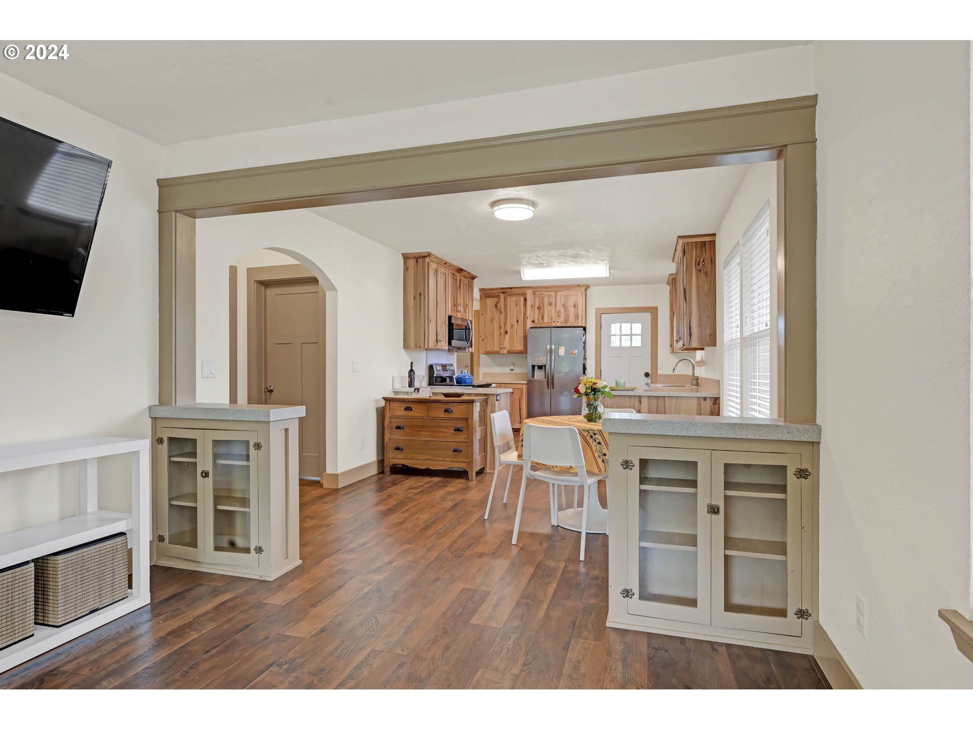 830 G Street Springfield, OR 97477 - Photo 18 of 38 a open kitchen with cabinets and a wooden floor