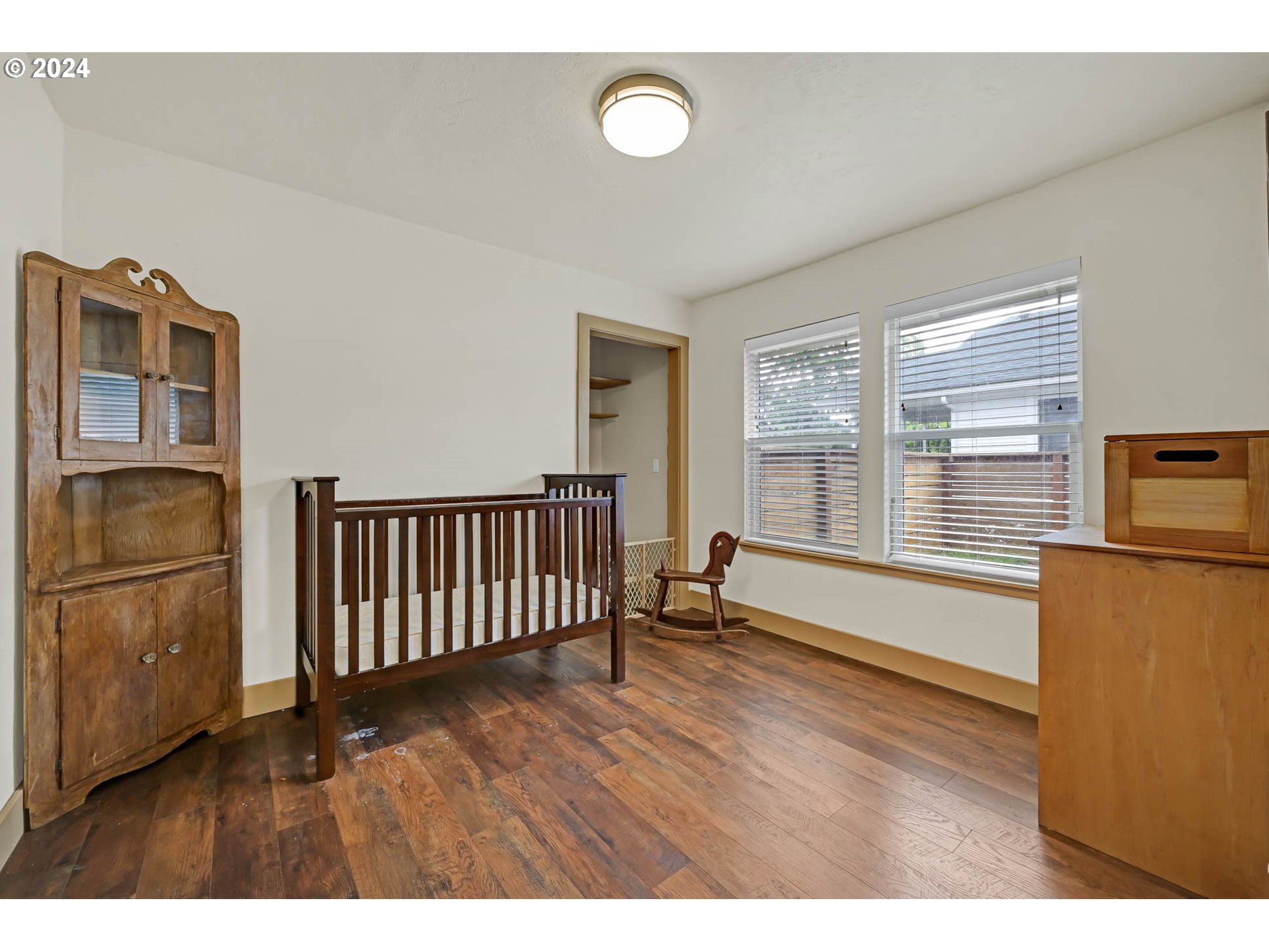 830 G Street Springfield, OR 97477 - Photo 21 of 38 a view of a livingroom with furniture wooden floor and window