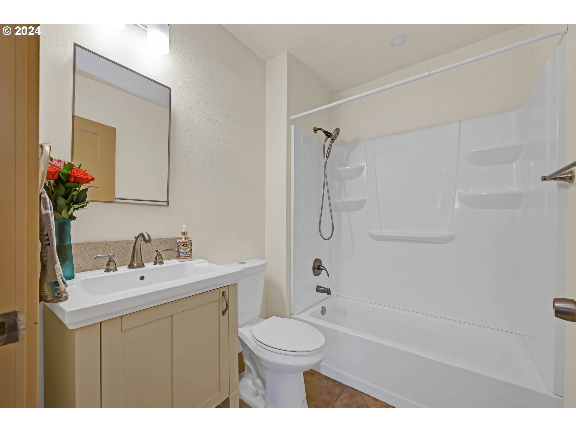 830 G Street Springfield, OR 97477 - Photo 23 of 38 a bathroom with a sink a toilet and shower