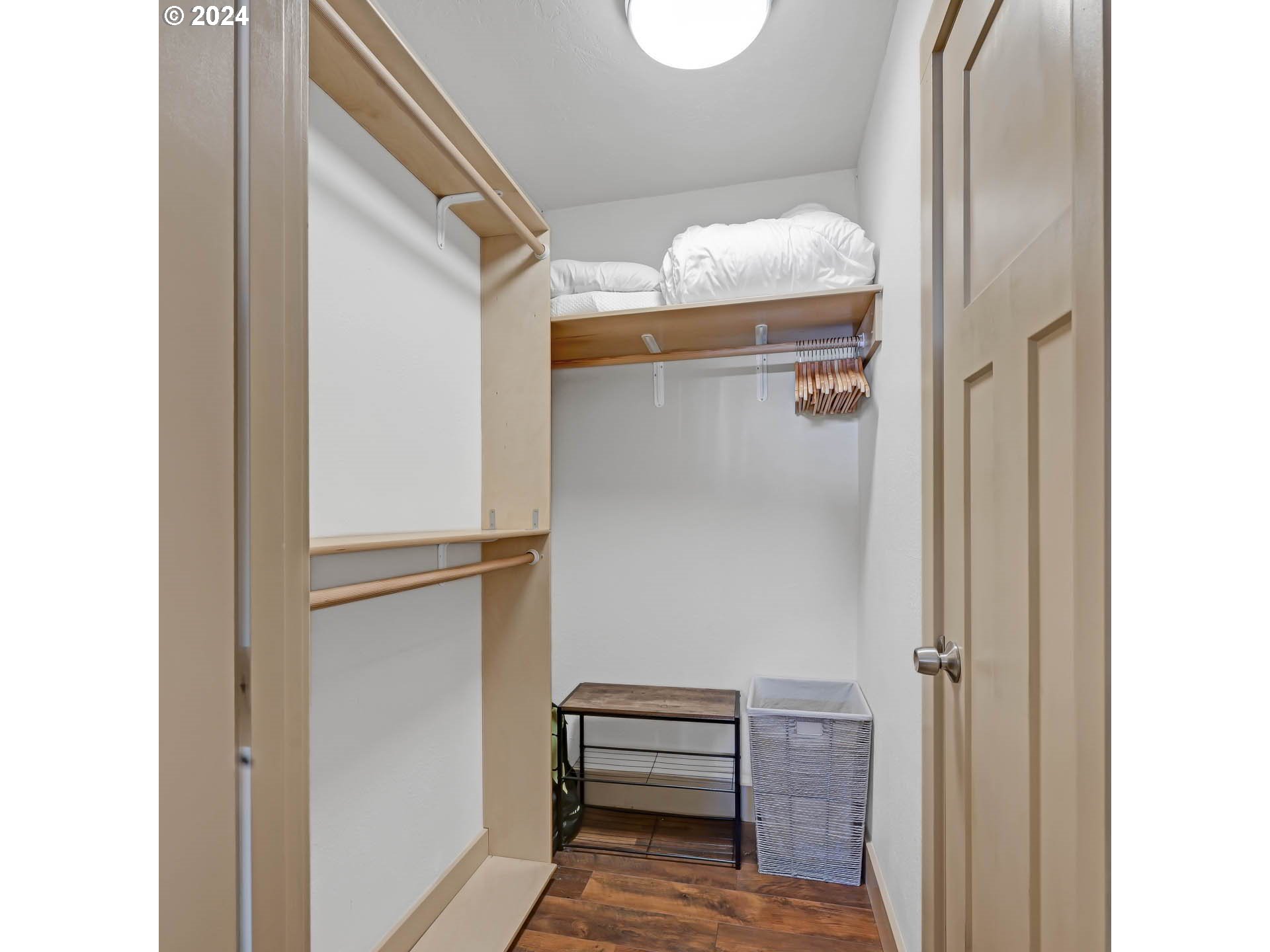 830 G Street Springfield, OR 97477 - Photo 30 of 38 a view of walk in closet with clothes and shoes