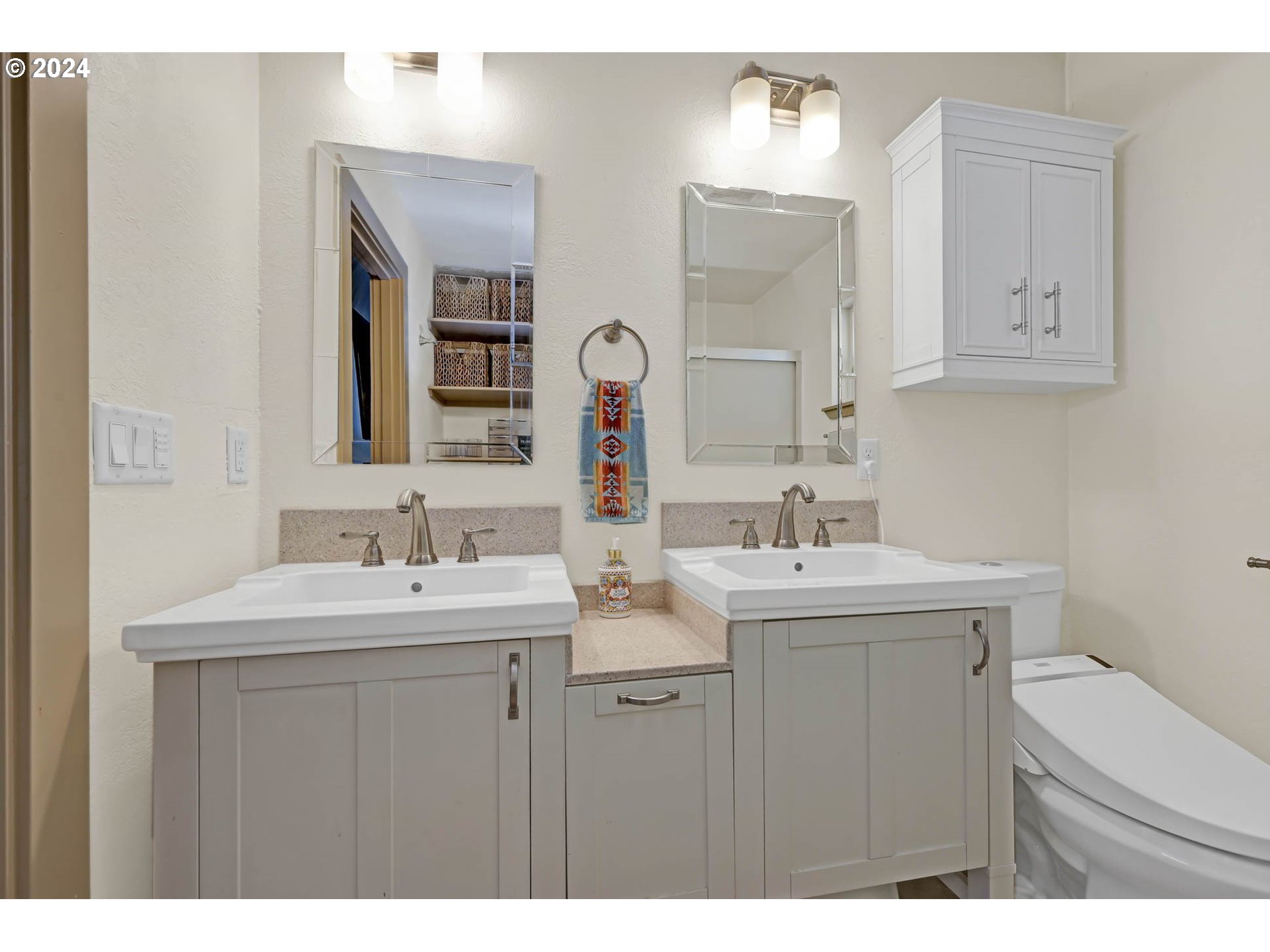 830 G Street Springfield, OR 97477 - Photo 32 of 38 a bathroom with a sink and a mirror