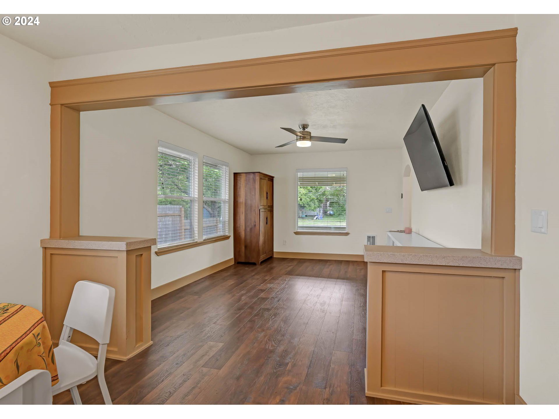 830 G Street Springfield, OR 97477 - Photo 10 of 38 a view of livingroom with furniture window and wooden floor