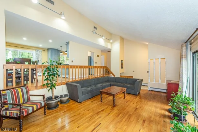 a living room with furniture and a table
