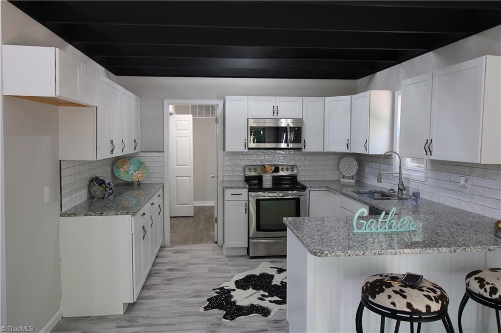 1708 Three Meadows Road Greensboro, NC 27455 - Photo 5 of 38 Gallery Image 5