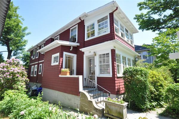 128 University Road, Unit 128 Brookline, MA 02445 - Photo 1 of 1 a front view of a house with a yard
