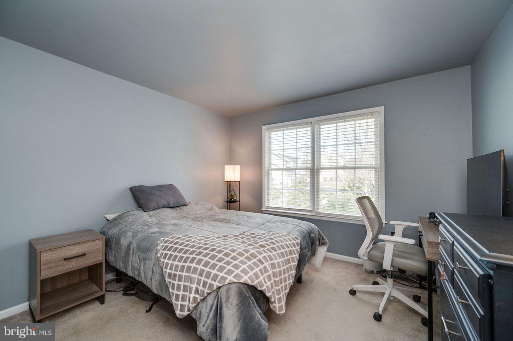 36 Pickwick Place Birdsboro, PA 19508 - Photo 31 of 72 a bedroom with a bed and a desk
