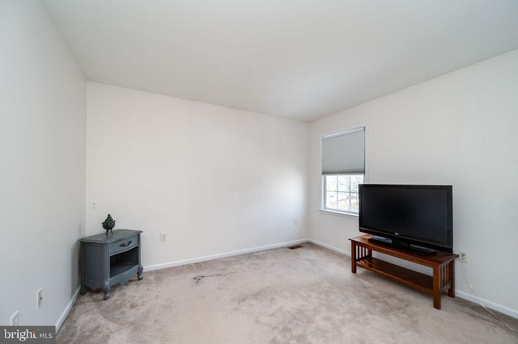 36 Pickwick Place Birdsboro, PA 19508 - Photo 34 of 72 a living room with furniture and a flat screen tv