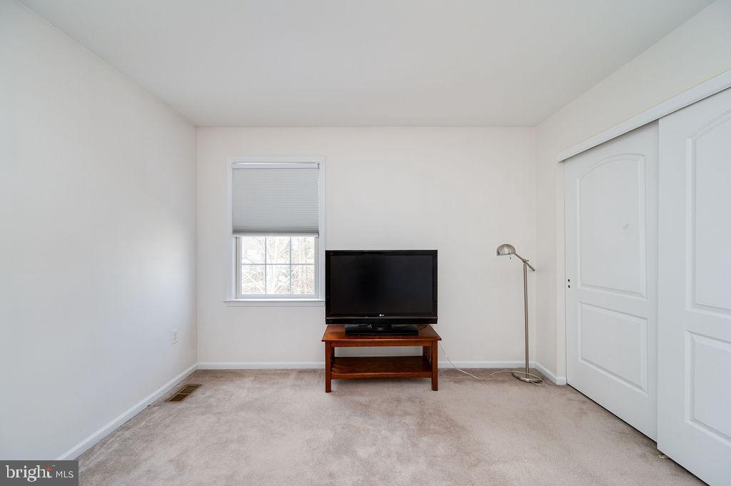 36 Pickwick Place Birdsboro, PA 19508 - Photo 35 of 72 a living room with a flat screen tv and a window