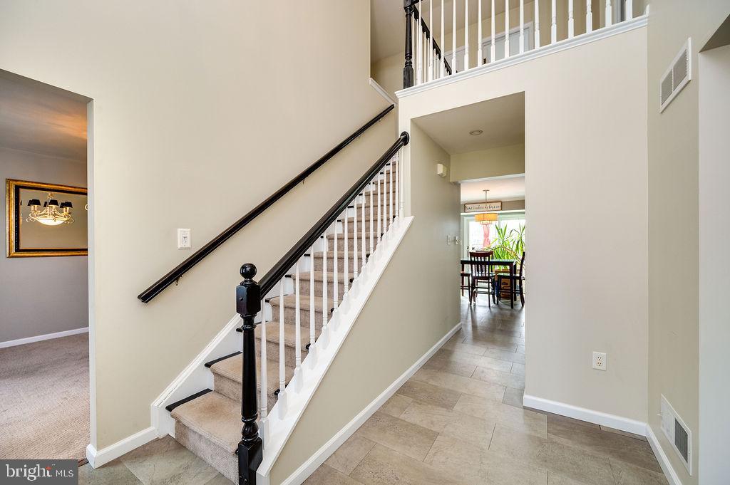 36 Pickwick Place Birdsboro, PA 19508 - Photo 5 of 72 a view of staircase with wooden floor and a rug