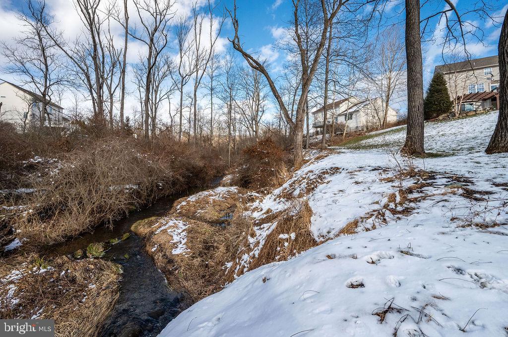36 Pickwick Place Birdsboro, PA 19508 - Photo 65 of 72 a view of a yard covered with snow in the front