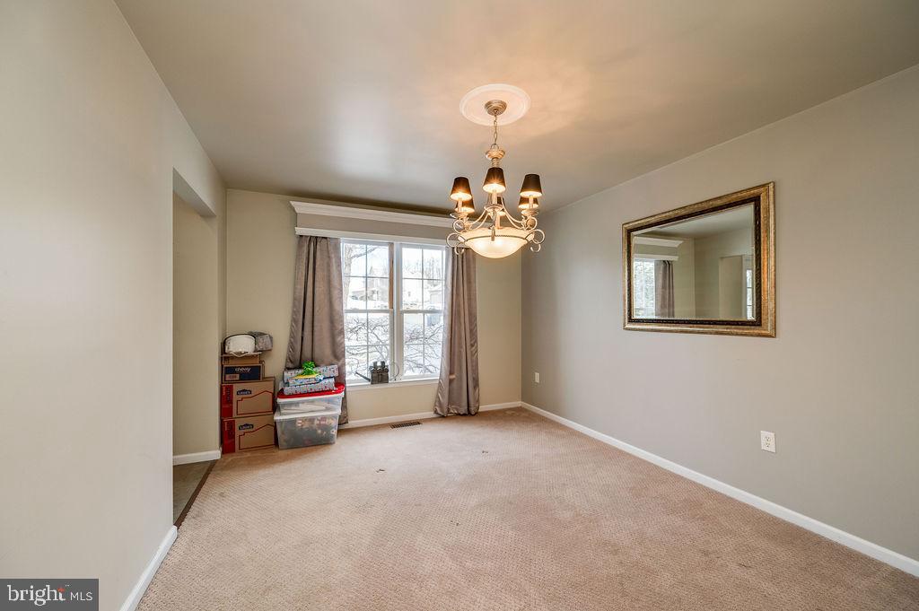 36 Pickwick Place Birdsboro, PA 19508 - Photo 7 of 72 a living room with furniture and a chandelier