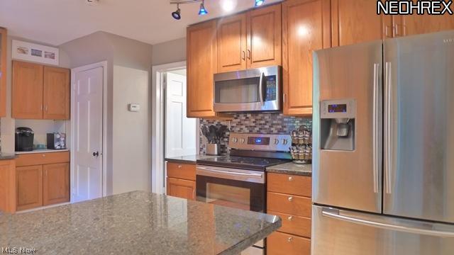 Updated custom lighting, this kitchen is wonderful for entertaining!
