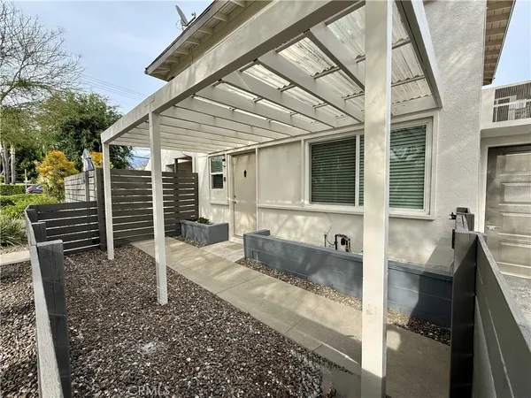 a front view of a house with stairs