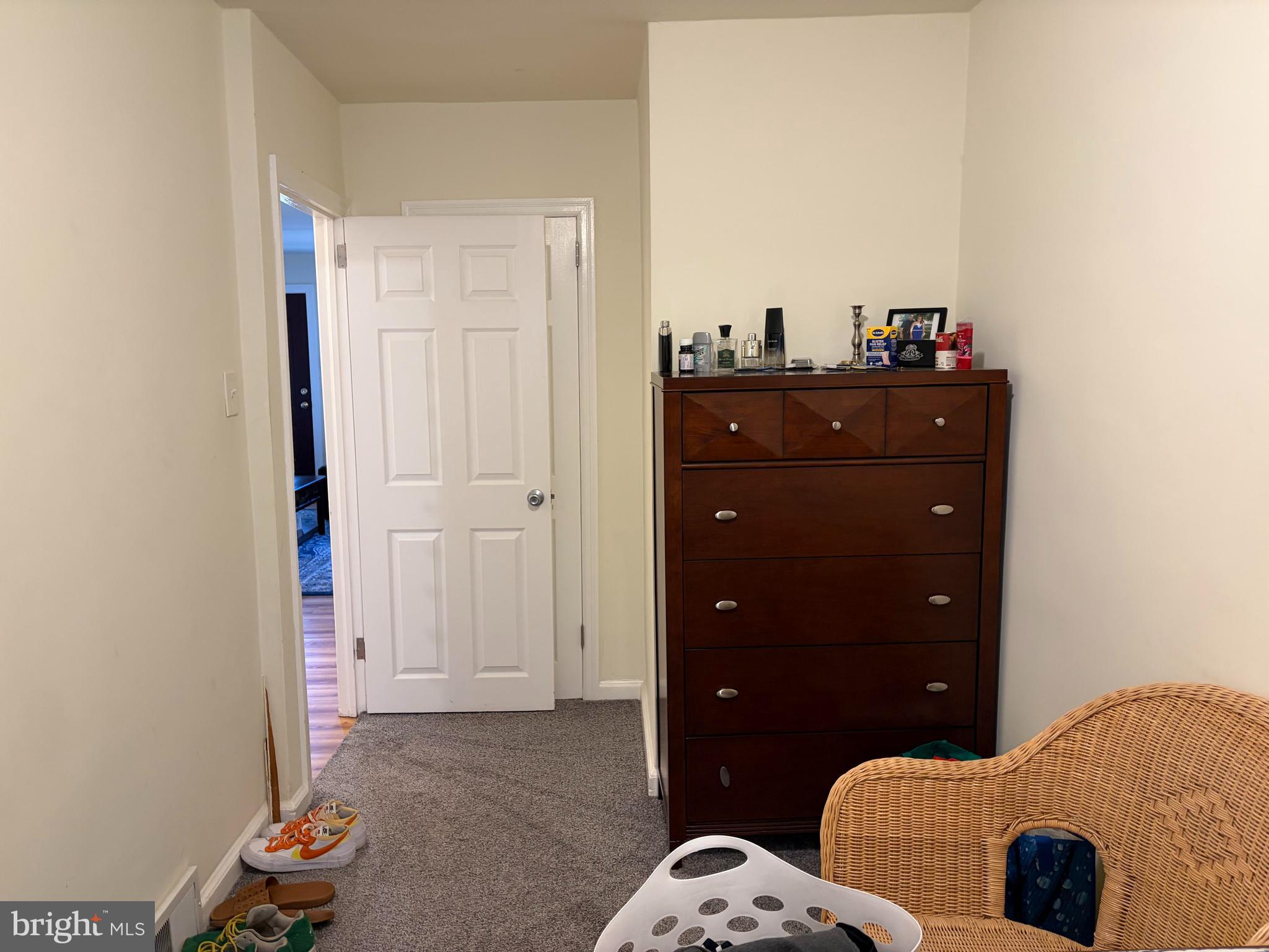 734 Primos Avenue Clifton Heights, PA 19018 - Photo 11 of 16 a bedroom with a bed and a dresser