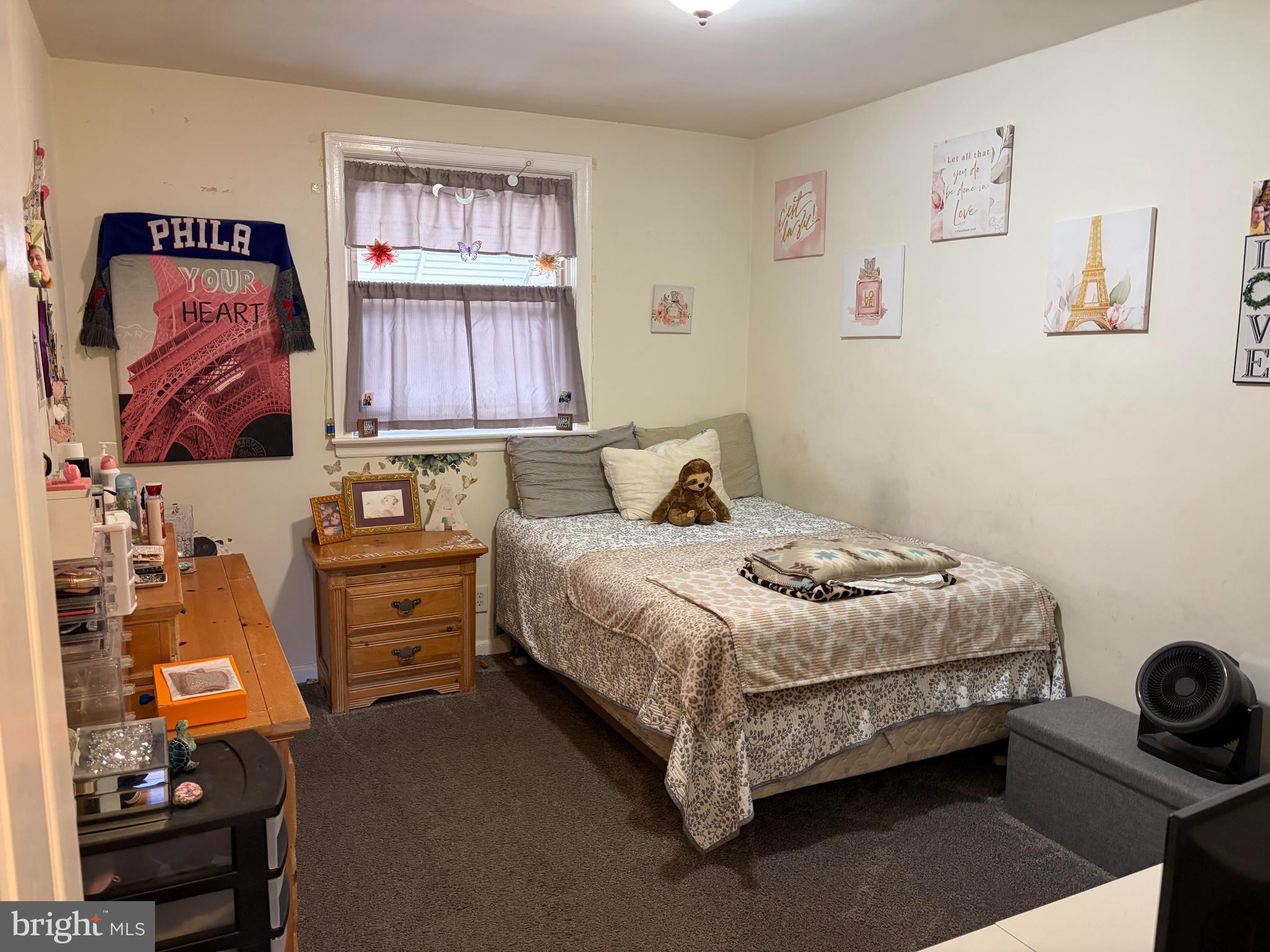 734 Primos Avenue Clifton Heights, PA 19018 - Photo 12 of 16 a bedroom with a bed and a window