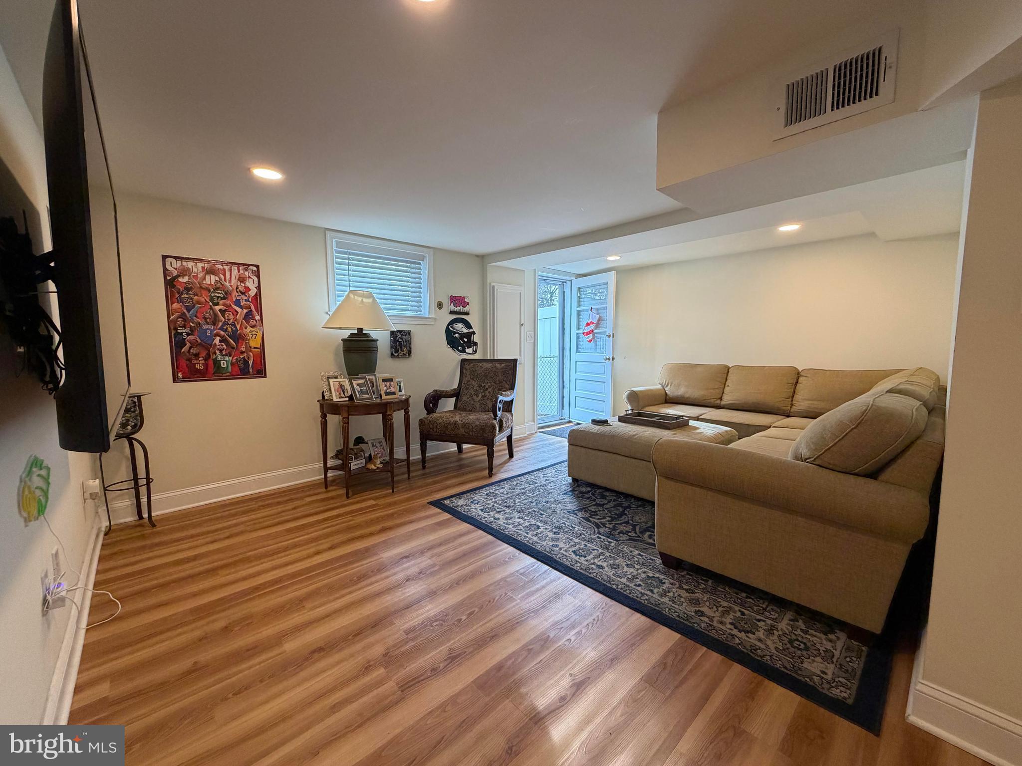 734 Primos Avenue Clifton Heights, PA 19018 - Photo 14 of 16 a living room with furniture and wooden floor