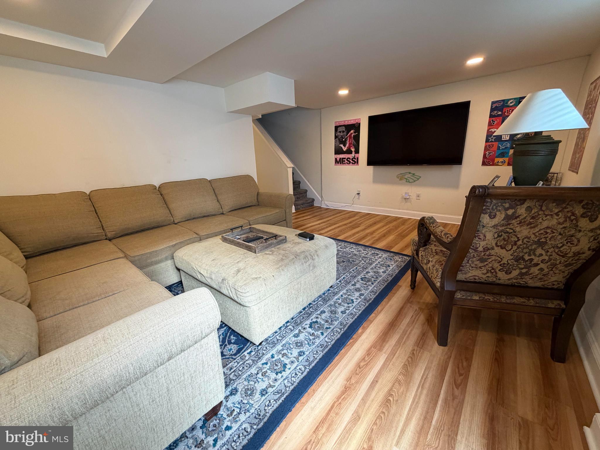 734 Primos Avenue Clifton Heights, PA 19018 - Photo 15 of 16 a living room with furniture and a flat screen tv