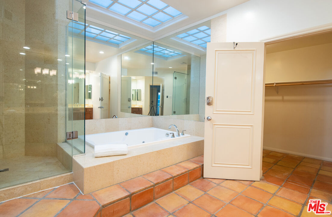 115 Roma Court Marina del Rey, CA 90292 - Photo 30 of 59 a bathroom with a large tub shower and sink