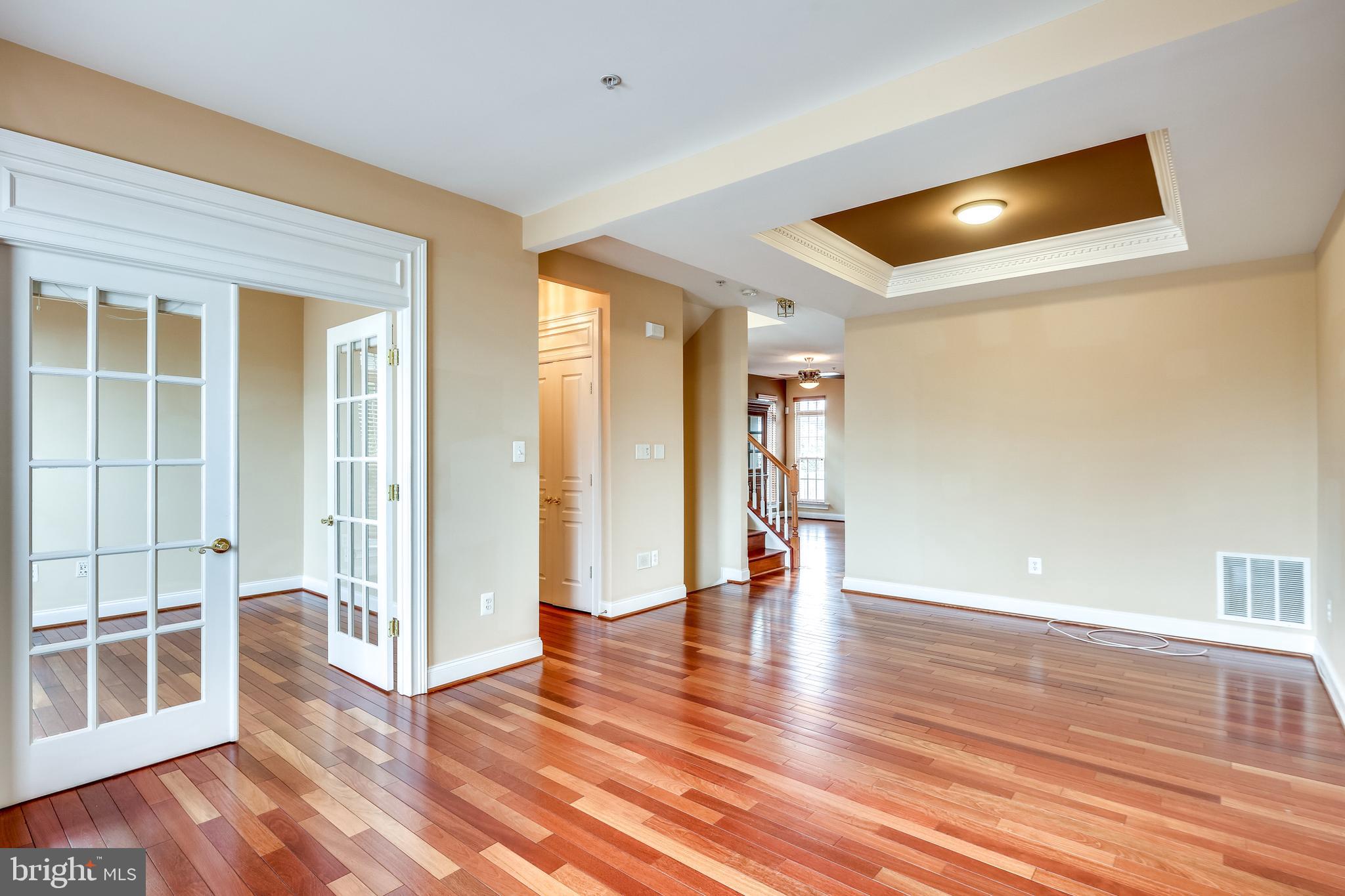 8068 Four Quarter Road Ellicott City, MD 21043 - Photo 14 of 42 Dining room with a tray ceiling