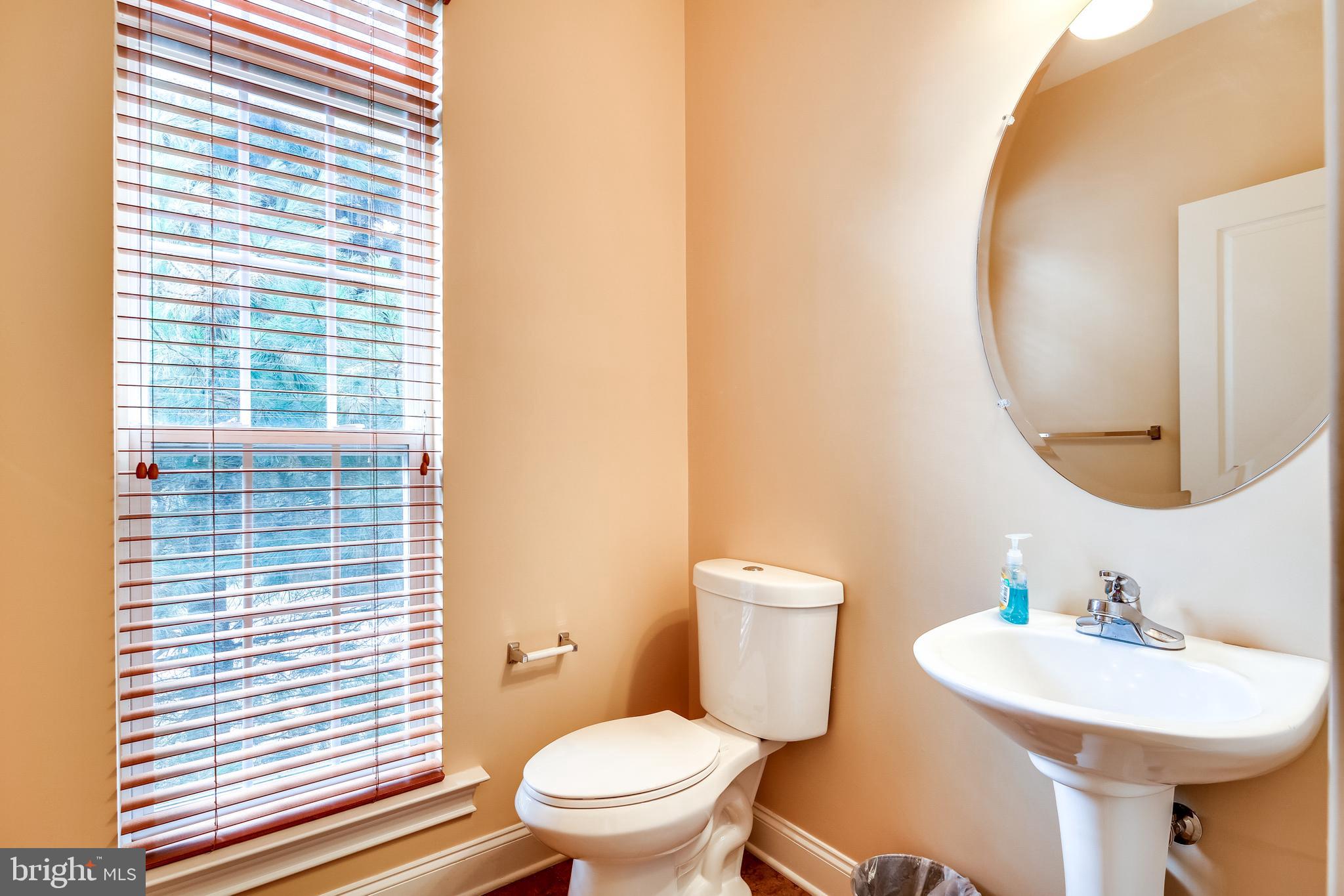 8068 Four Quarter Road Ellicott City, MD 21043 - Photo 17 of 42 Half bath on the main level