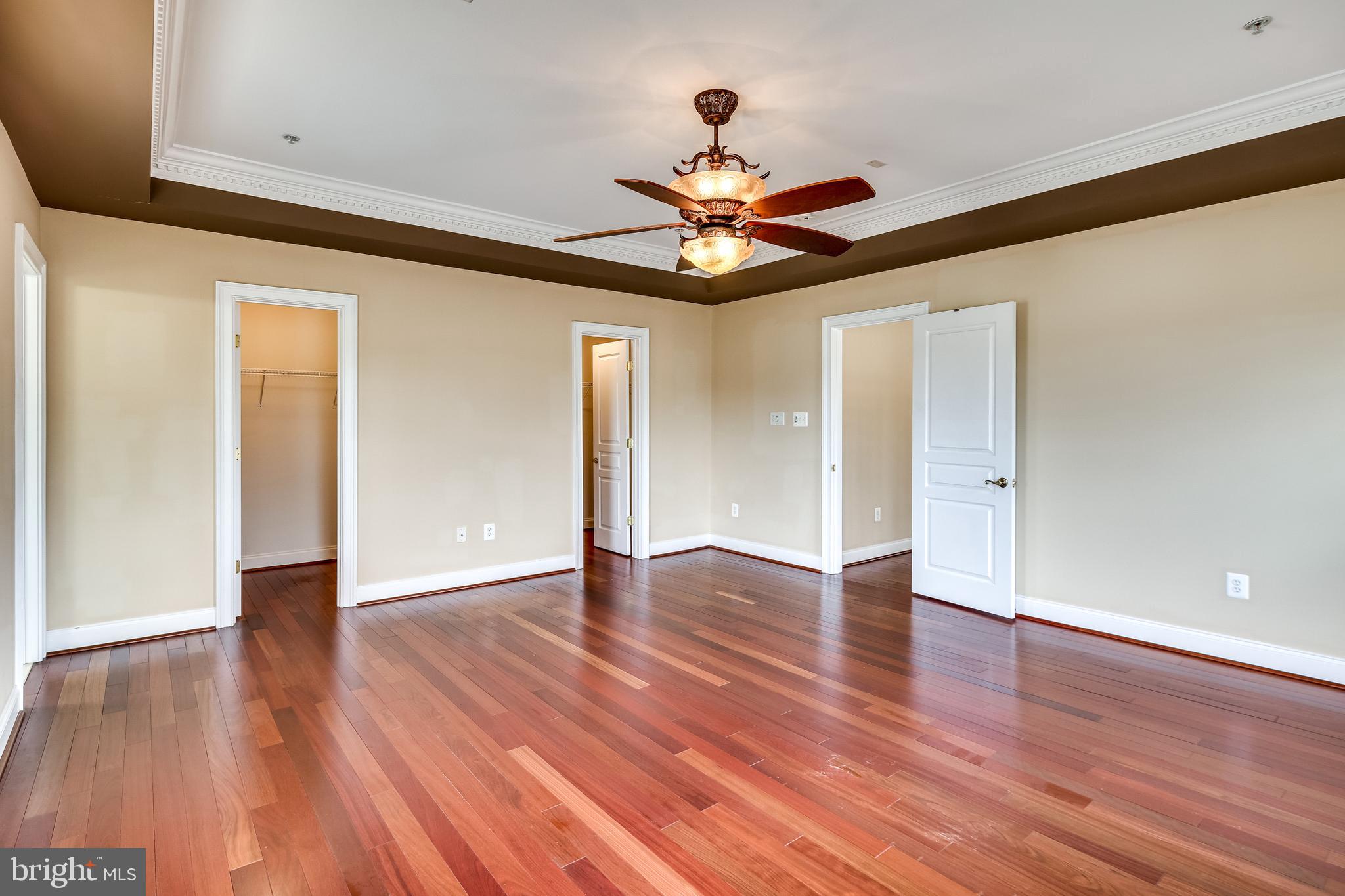 8068 Four Quarter Road Ellicott City, MD 21043 - Photo 20 of 42 Primary bedroom with tray ceilings
