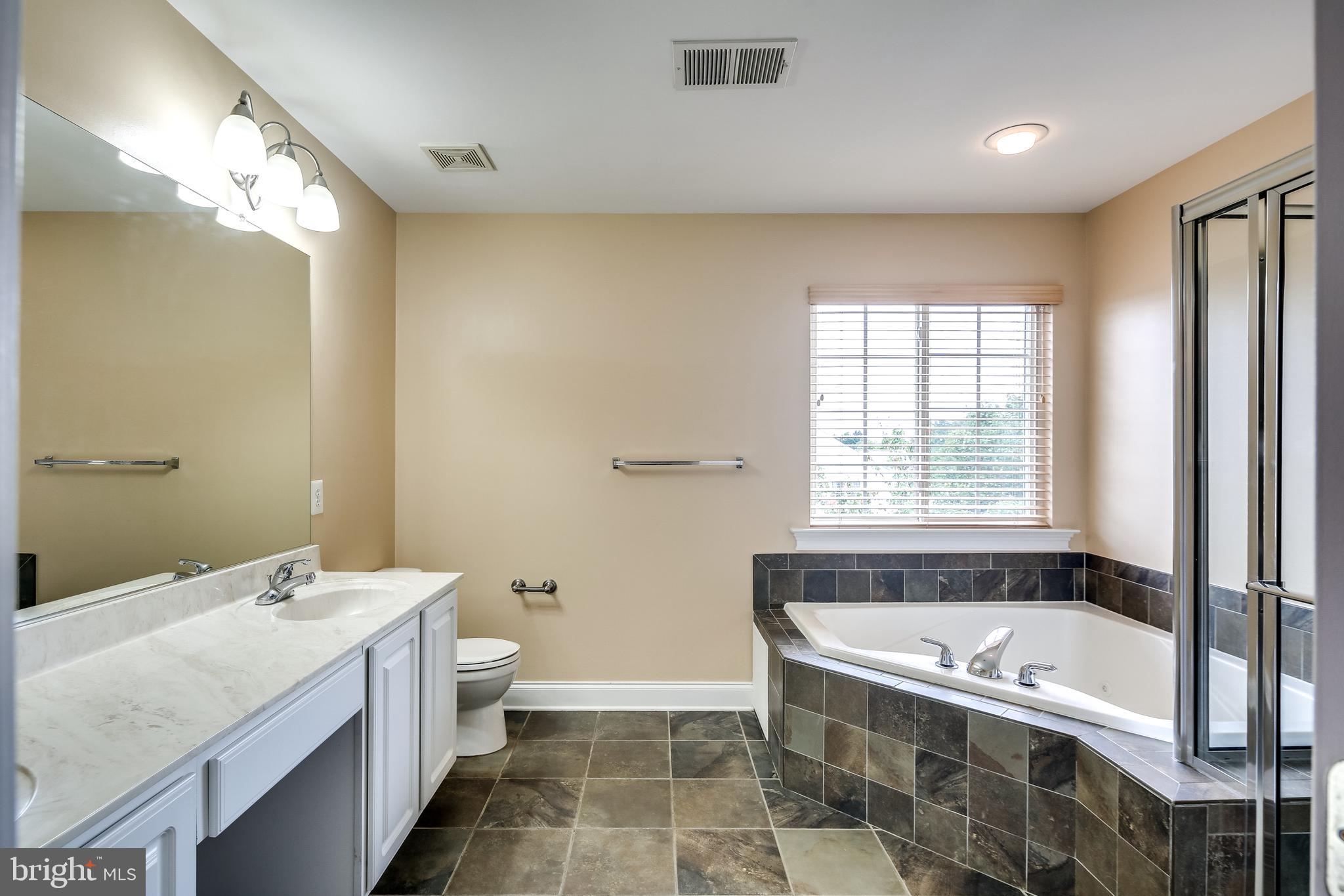 8068 Four Quarter Road Ellicott City, MD 21043 - Photo 21 of 42 Primary bathroom