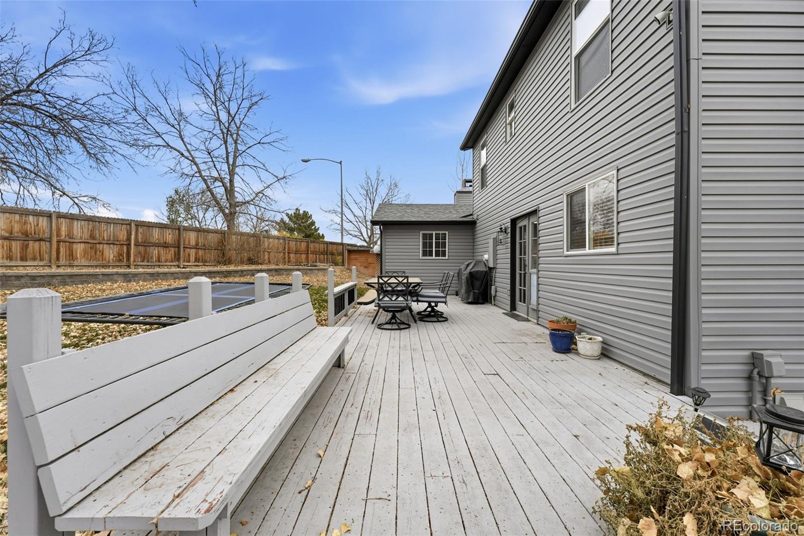 4993 East 111th Place Thornton, CO 80233 - Photo 39 of 50 a view of a terrace with sitting area