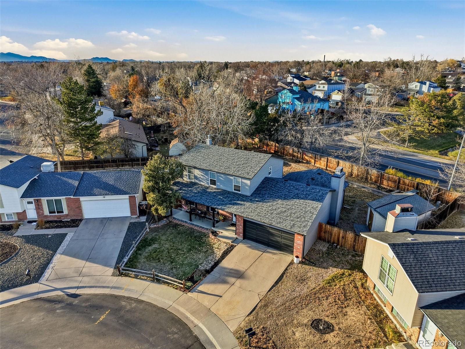 4993 East 111th Place Thornton, CO 80233 - Photo 44 of 50 an aerial view of a house with a yard