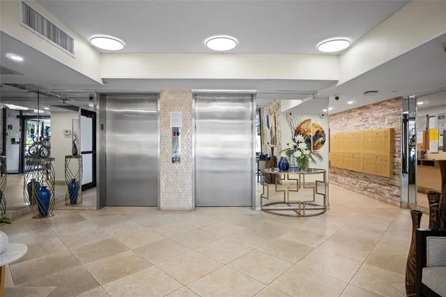 a room with stainless steel appliances lots of counter space and cabinets