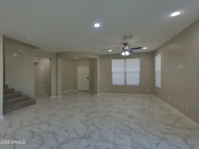 a view of an empty room and window